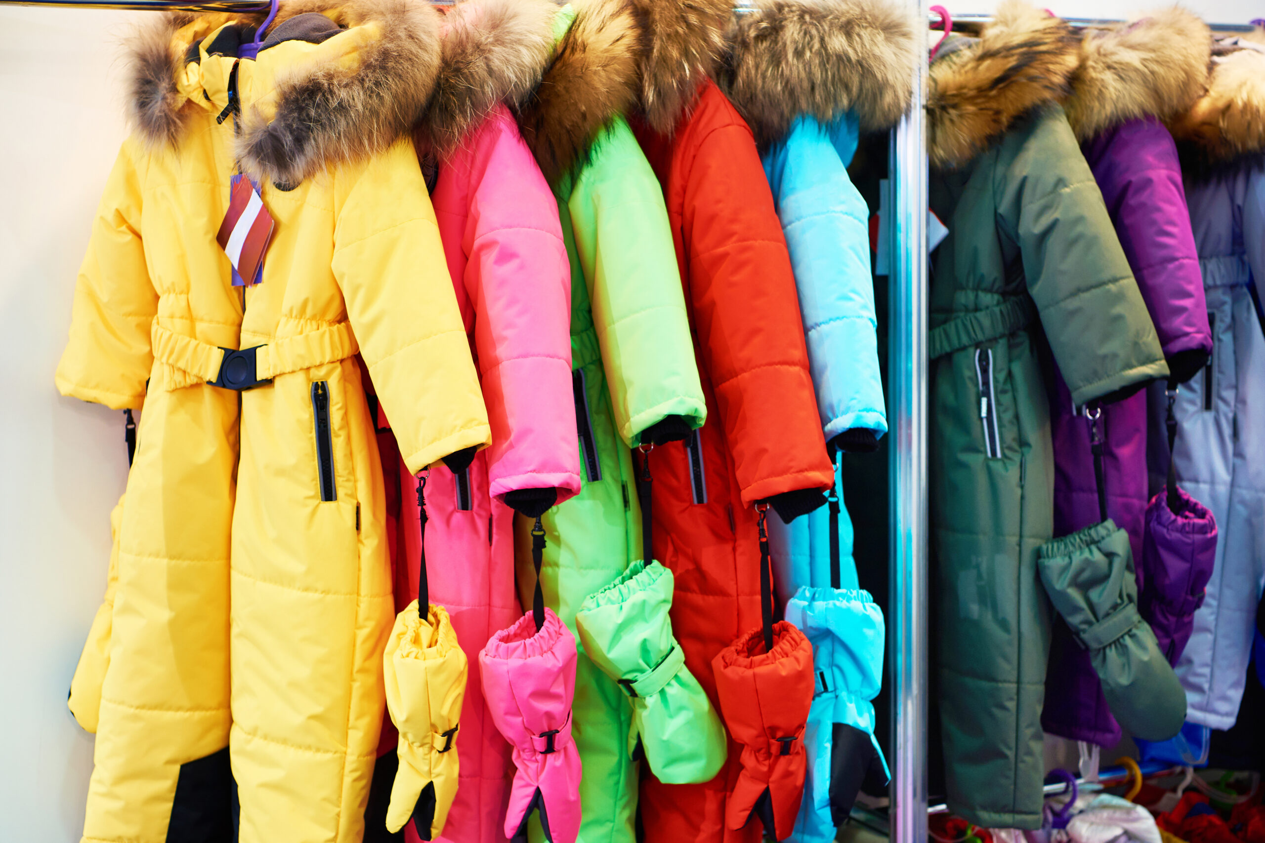 Winter kids ski suits in the store