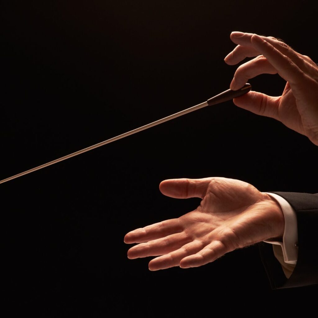 Dirigent Hände mit Stab im Konzert